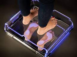 Examen sur podoscope. On voit bien les appuis